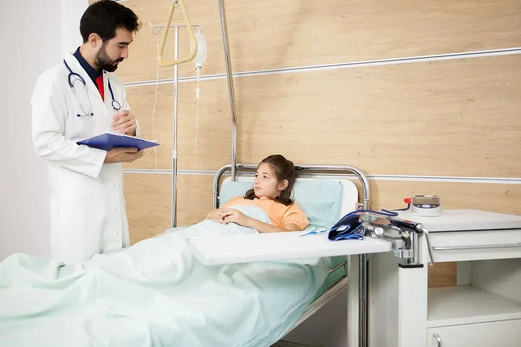 Doctor examining young patient