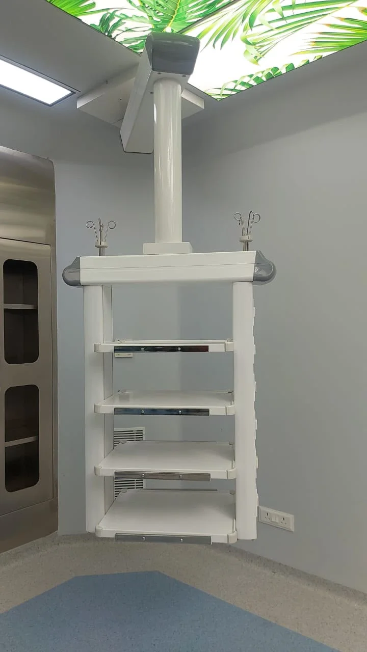 Ceiling-mounted OT pendant with equipment shelves by Gaddiel